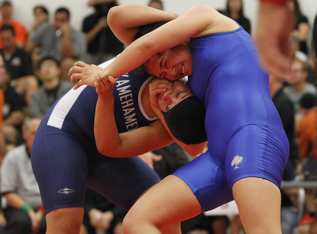 Kamehameha's Taj Vierra wrestled Punahou's Zoe Hernandez at 140 pounds in the finals of the 2014 ILH Championships. Photo by Jamm Aquino/Star-Advertiser. 