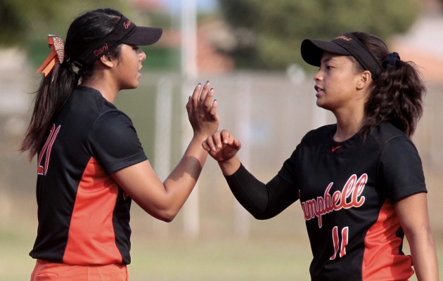 Campbell pitcher Dani Cervantes, left, high-fived shortstop Chardonnay Pantastico after a 5-0 win over Mililani on March 22. Jamm Aquino / Honolulu Star-Advertiser.