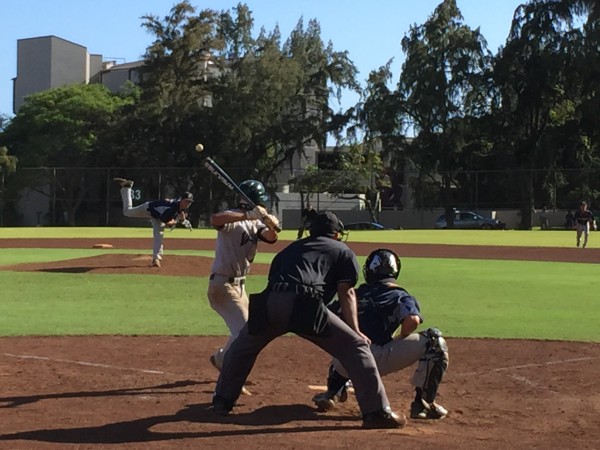 Punahou's Kahi Bisho hurls a pitch against Mid-Pacific's Zach Gushiken during the fifth inning. 