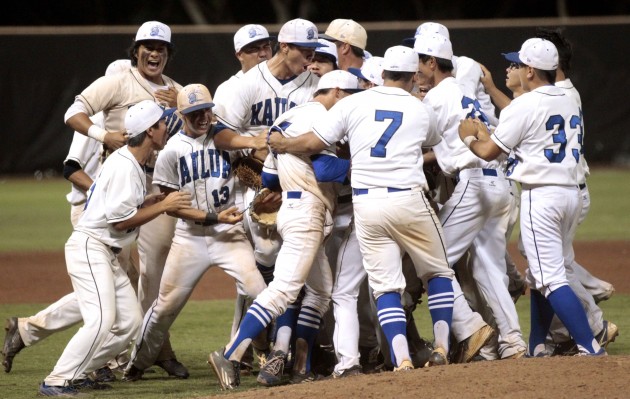 The Kailua Surfriders celebrate after the seventh inning of  the 2016 OIA Division I baseball championship game between the Kailua Surfriders and the Kalani Falcons on Saturday, April 23, 2016 at Hans L'Orange Park in Waipahu. Jamm Aquino/Star-Advertiser
