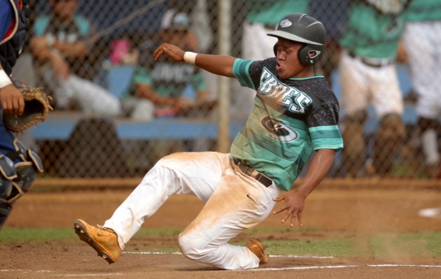 Kapolei's Tristen Manoha-Diaz (1) scores at home plate during the second inning of the 2016 OIA Division II baseball championship game between the Kalaheo Mustangs and the Kapolei Hurricanes on Saturday, April 23, 2016 at Hans L'Orange Park in Waipahu.  Kapolei won 9-4. Jamm Aquino/Star-Advertiser