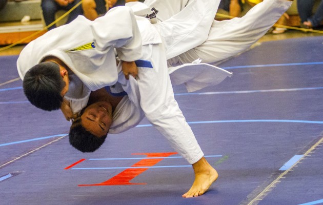 Kalani's Micah Takeyama won by ippon over McKinley's Daniel Tiamzon in the OIA boys' 145-pound final. Photo by Dennis Oda/Star-Advertiser.