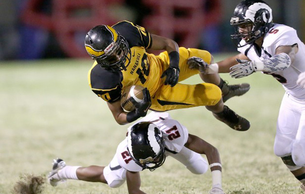 Nanakuli's Keliki Amaral-Palakiko was tripped up by a Radford defender in a game last season. Both the Golden Hawks and Rams will play in Division I instead of D-II this season. Jay Metzger / Special to the Honolulu Star-Advertiser.