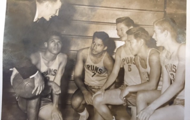 Punahou's 1964 team with head coach Bud Scott. Pictured (not in order) are Scott,  Chris McLachlin, Leland Pestano, Charlie Wedemeyer, Norm Chow, and Lloyd "Spider" Wong. Courtesy of the Scott family.