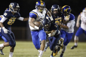 Andrew Kaufusi broke away from the defense to score a touchdown against Waipahu as a junior. Photo by George F. Lee/Star-Advertiser.