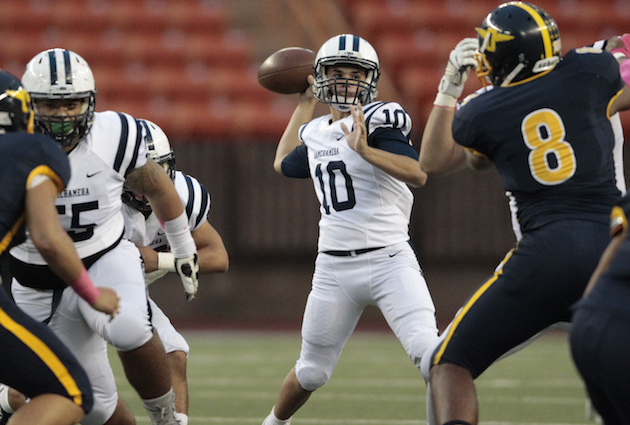 Senior Justice Young, who holds Kamehameha's single-game passing record, will contend with Boogie Yam for the starting QB job. Photo by Jamm Aquino/Star-Advertiser.