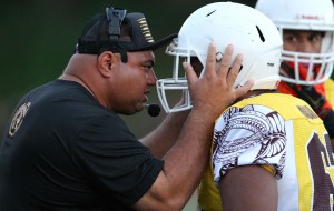 Mililani head coach Rod York yelled at offensive lineman Sergio Muasau after he was ejected from the game against the Crusaders. Photo by Jamm Aquino/Star-Advertiser.