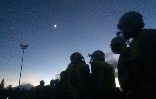 Mililani football players were silhouetted in the darkness last fall after their preseason game against Saint Louis was called off after being partially played because the lights went out. The Hawaii High School Athletic Association football committee is working on a proposal for some changes in Year 2 of the three-division state tournament. Jamm Aquino / Honolulu Star-Advertiser.
