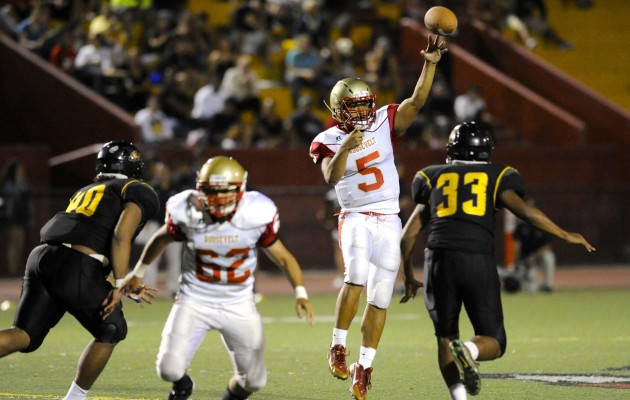 Roosevelt quarterback Shastyn Kekahuna led the Rough Riders to a 41-14 win over McKinley in Week 2. Bruce Asato / Honolulu Star-Advertiser.