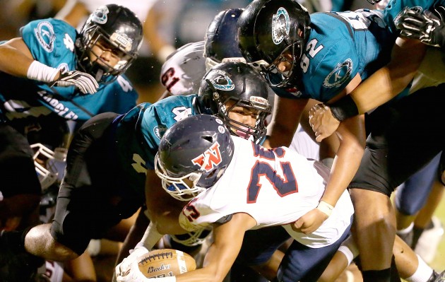 Waianae's Kade Ambrocio scored the first touchdown against Kapolei as the Seariders rolled to a 35-14 win in August. Photo by Jay Metzger/Special to the Star-Advertiser.