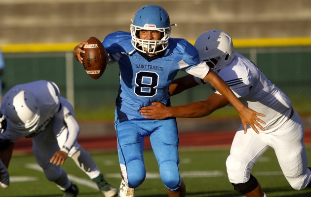 St. Francis quarterback Bubba Akana leads the Saints against Pac-Five tonight at Aloha Stadium. Photo by Cindy Ellen Russell/Star-Advertiser.