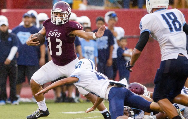 Farrington running back Challen Faamatau ran after recovering a fumble in the first quarter against Kailua. Cindy Ellen Russell/crussell@staradvertiser.com 