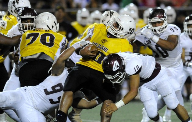 Mililani’s Jalen Olomua is stopped by Farrington’s Tyrese Futialo and Faasisina Masalosalo  in the second quarter of the Farrington vs Mililani football game at Mililani's John Kauinana field, Saturday, August 27, 2016. HSA Photo by Bruce Asato.