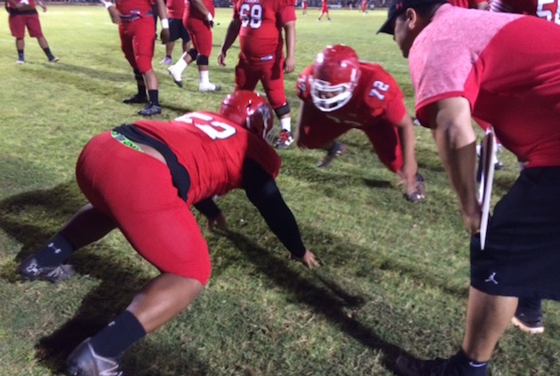 Kahuku linemen face off prior to Friday night's showdown with No. 4 Waianae. Photo by Bruce Asato/Star-Advertiser.