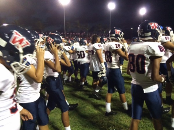 Waianae getting ready pregame. Photo by Bruce Asato/Star-Advertiser.