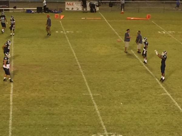 Waianae wide receiver Isaiah Freeney catching passes from Jaren Ulu in warmups. 