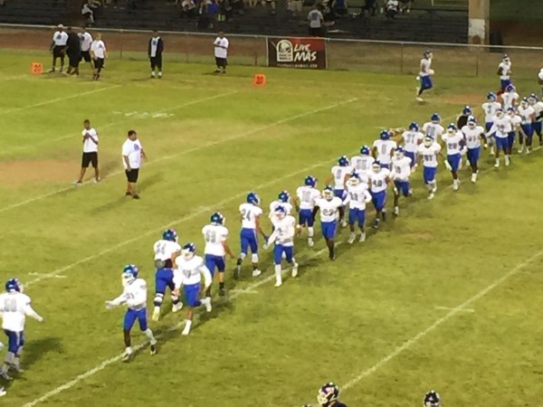 Moanalua begins warmups. 