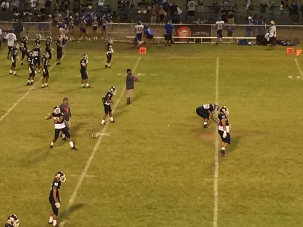 Waianae quarterback Jaren Ulu warms up. 