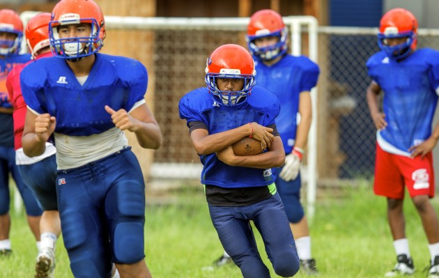Kalaheo players ran through drills at practice in early-August. Photo by Dennis Oda/Star-Advertiser.