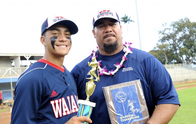 Kekoa Kaluhiokalani, right, and his son, Kekoa Kaluhiokalani Jr., celebrated the 2013 OIA White baseball championship. Kaluhiokalani, who was Waianae's baseball head coach from 2003 to 2014, is now the school's athletic director. Bruce Asato / Honolulu Star-Advertiser.
