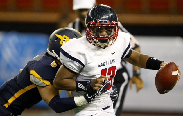 Saint Louis quarterback Tua  Tagovailoa went in as a blocker on special teams for one play against Punahou on Thursday night. In the photo, Tagovailoa is pictured against Punahou in a Sept. 9 game. Jamm Aquino / Honolulu Star-Advertiser.