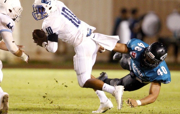 Kailua visits Waianae tonight with a berth in the state tournament on the line. In photo, Surfriders quarterback Mark Lagazo is pictured in a Sept. 16 loss to Kapolei. Jamm Aquino / Honolulu Star-Advertiser.