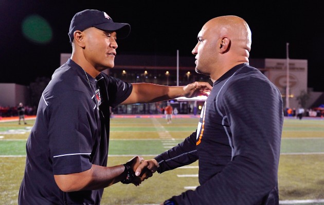 Kahuku coach Vavae Tata and Bishop Gorman coach Kenny Sanchez shook hands after the Gaels defeated the Red Raiders 35-7 in Las Vegas. Photo by David Becker/Special to the Star-Advertiser.