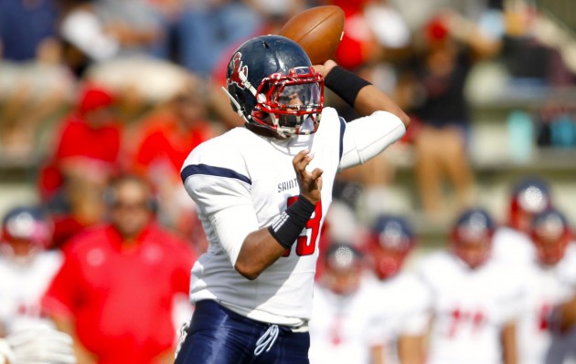 Saint Louis QB Tua Tagovailoa threw for a school-record 493 yards against 'Iolani to take over the ILH lead in passing. Photo by Jamm Aquino/Star-Advertiser.