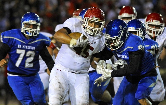 Kahuku's Steven Lombard is one of 12 Red Raiders with at least one rushing touchdown this season. Photo by Bruce Asato/Star-Advertiser.