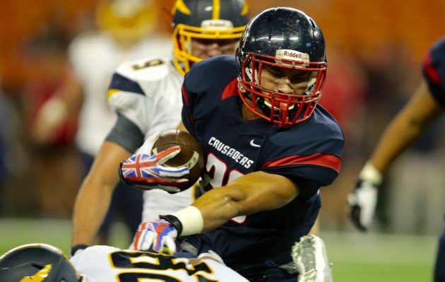 Saint Louis' Ronson Young scored a touchdown against Punahou during the Buffanblu's 33-20 win on Sept. 29. The two teams play again for the ILH championship on Friday night at Aloha Stadium. Jamm Aquino / Honolulu Star-Advertiser.