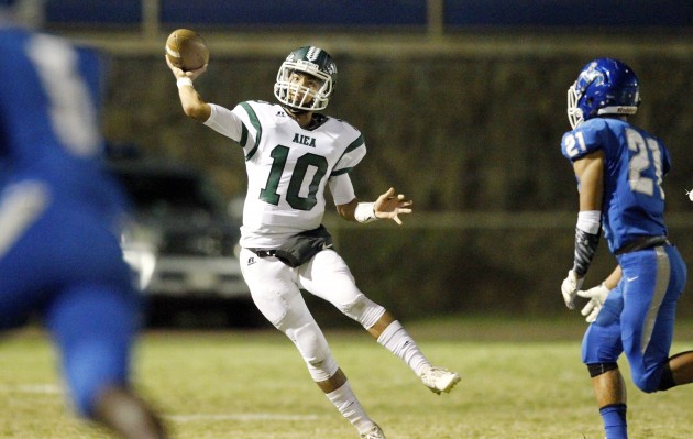 Aiea quarterback Kobe Kato led Na Alii's comeback bid in a 42-27 loss in the first round of the OIA playoffs last Saturday. In photo, Kato is pictured throwing a pass in a regular-season game against Moanalua. George F. Lee / Honolulu Star-Advertiser.