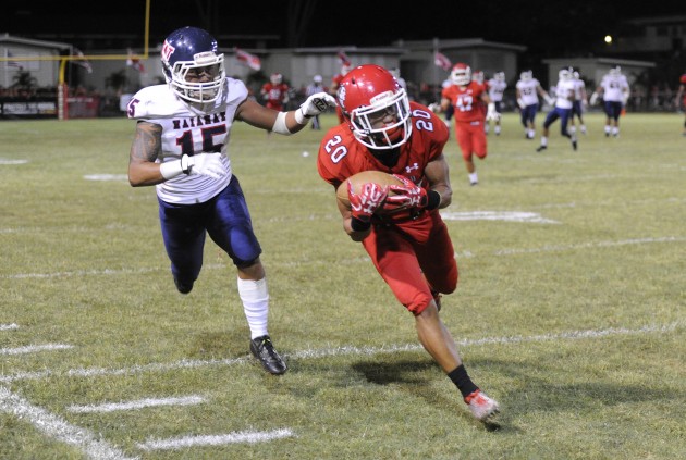 Kahuku's Stokes Nihipali-Botelho has scored eight touchdowns this season on defense and special teams. Photo by Bruce Asato/Star-Advertiser.