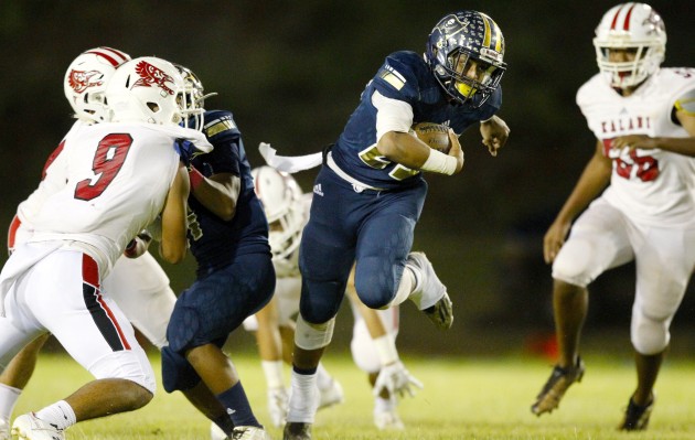 Waipahu's Alfred Failauga rushed for 156 yards in Friday's 13-7 OIA semifinal win over Pearl CIty at the Aiea High field. In photo, Failauga ran for good yardage in an Oct. 8 game against Kalani. George F. Lee / Honolulu Star-Advertiser.