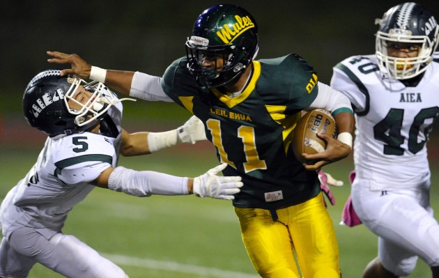 Leilehua is one of 12 teams around the state to have qualified for one of the three state tourament divisions. In photo, Mules receiver Kawai Phifer put a tried to get around Aiea's Noah Taiese during a punt return in last Saturday's OIA playoff game. Leilehua won 42-27. Bruce Asato / Honolulu Star-Advertiser.