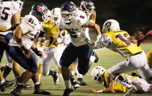 Waianae's Rico Rosario rushed for 197 yards against Mililani. The Seariders won 36-33 to advance to the OIA semifinals and clinch a spot in the upcoming state Open division. George F. Lee / Honolulu Star-Advertiser.