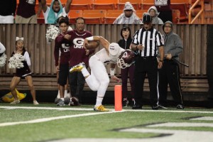 Challen Faamatau's 16th rushing TD of the season cut Kahuku's lead to 10-6 in the first quarter. Photo by Jamm Aquino/Star-Advertiser.