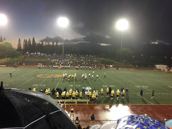 A consistent drizzle fell throughout the JV game between Waianae and Mililani. Skies have cleared for the varsity kickoff. Friday, Oct. 21, 2016. 