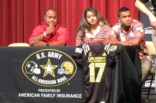 Galu and Diane Tagovailoa wait with son Tua for the US Army All-American Bowl presentation to begin at Mamiya Theater on the Saint Louis School campus. Wednesday, Nov. 30, 2016.