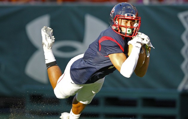 To watch the football state championships live, you have to purchase a ticket or buy pay-per-view. In photo, a Saint Louis receiver caught a pass during last week's Open division semifinal victory over Waianae. Jamm Aquino / Honolulu Star-Advertiser. 