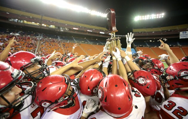 Lahainaluna celebrated its first state football title after beating Kapaa 21-14 in the D-II final on Friday night. Photo by Jamm Aquino/Star-Advertiser.