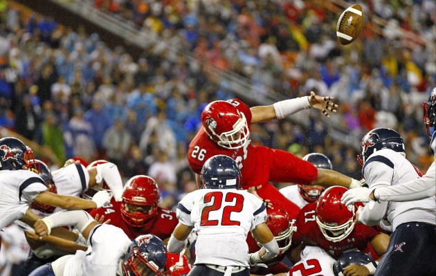 Kahuku senior Kesi Ah-Hoy lost the ball as he was trying to get into the end zone in the fourth quarter of the Open Division state final against Saint Louis. Photo by Jamm Aquino/Star-Advertiser.