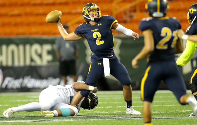 Punahou quarterback Stephen Barber proved to be a load for Kapolei to bring down on Saturday. Jamm Aquino / Star-Advertiser
