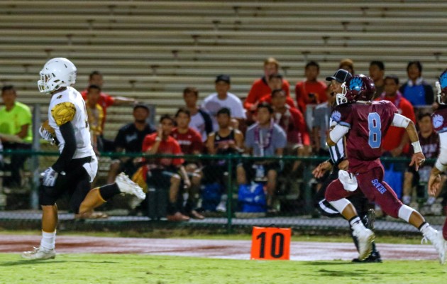 Mililani receiver Andrew Valladares left everyone in the dust on a 65-yard TD reception for his first of four against Baldwin. Photo by Bryan Berkowitz, Special to the Star-Advertiser.