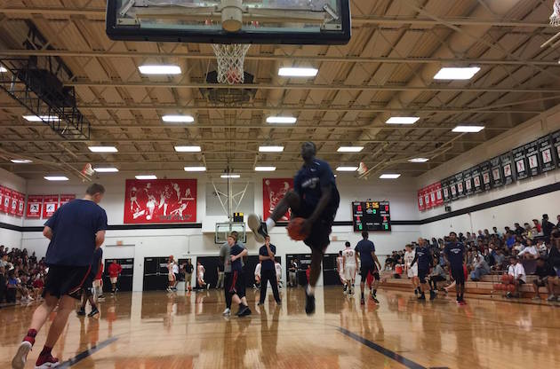 Oak HIll's Lamine Diane attempted a between-the-legs dunk in warmups on Monday. Photo by Paul Honda/Star-Advertiser.