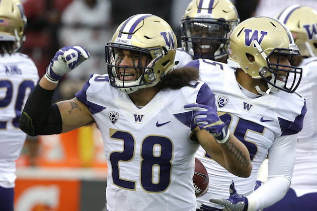 Washington linebacker Psalm Wooching, a 2012 Kealakehe graduate, started every game this season and will end his collegiate career playing in the College Football Playoff. Associated Press photo.