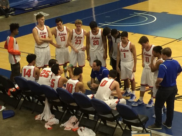 Kalaheo coach Rob Pardini with his team during a time out at the OIA-ILH Challenge. Saturday, Dec. 10, 2016