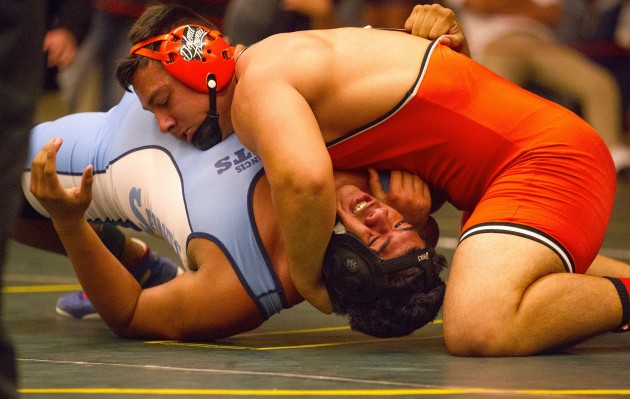 Campbell's Micah Tynanes pinned his opponent in the finals of the boys 220-pound division at the Hawaii Wrestling Officials Association Championships last month. Photo by Cindy Ellen Russell/Star-Advertiser.