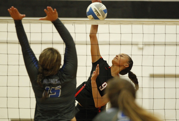 Elena Oglivie, shown putting down a kill against Moanalua in the state tournament, was named a Freshman All-American by CBS Max Preps. Photo by Jamm Aquino/Star-Advertiser.