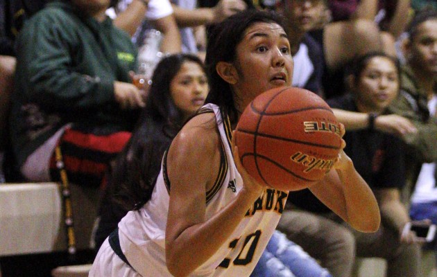 Kaimuki's Kaelyn Espinda (20) took aim for a three pointer in the second half of Friday’s game against Kalani. Cindy Ellen Russell/Star-Advertiser