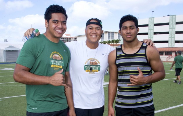 Punahou's Miki Suguturaga (left), Kahuku coach Vavae Tata (center) and Maui's Feleti Afemui are part of Ronnie Stanley's team in the Polynesian Bowl. Photo by Craig Kojima/Star-Advertiser.
